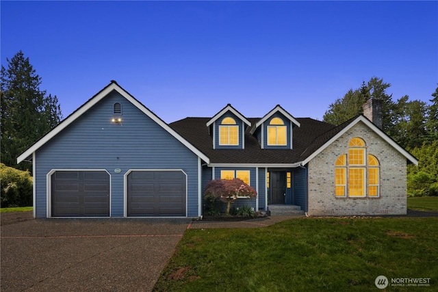 12425 318th Ave NE, Duvall, WA 98019 - traditional home featuring concrete driveway, an attached garage, a front lawn, and a chimney