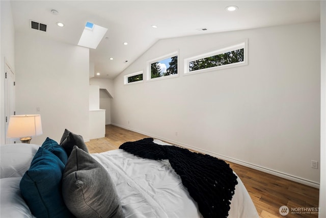 12425 318th Ave NE, Duvall, WA 98019 - bedroom with a skylight, light wood-type flooring, lofted ceiling, recessed lighting, and baseboards