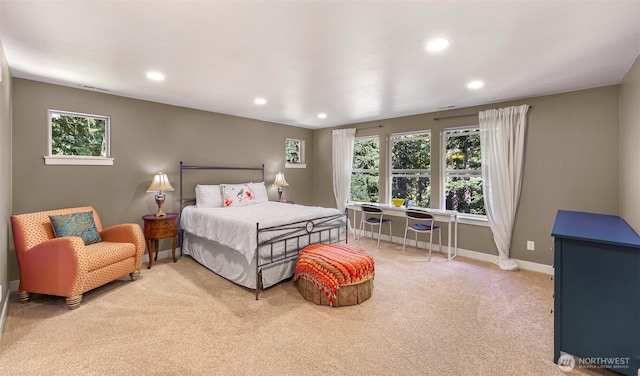 bedroom featuring carpet flooring, multiple windows, visible vents, and recessed lighting