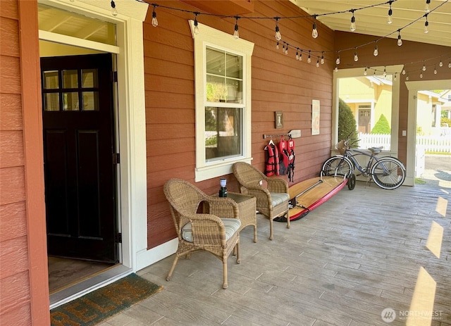 view of patio featuring fence