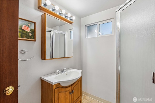 26 Pershing St, Wenatchee, WA 98801 - bathroom featuring vanity, a shower stall, and healthy amount of natural light