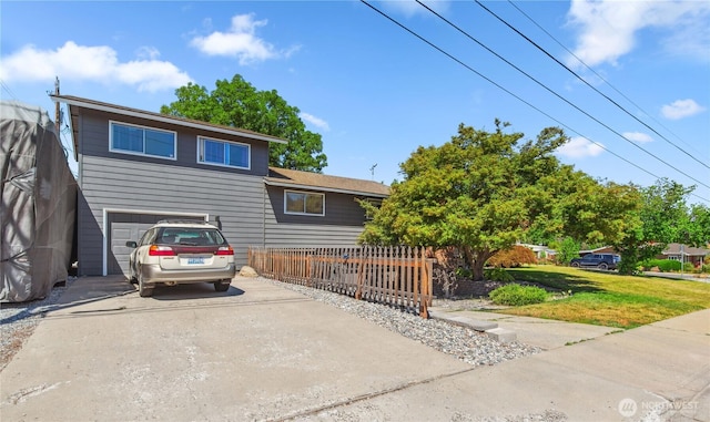 26 Pershing St, Wenatchee, WA 98801 - tri-level home with a garage and driveway