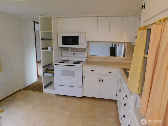 18329 32nd Ave S, Seatac, WA 98188 - kitchen with white appliances, light countertops, and white cabinets