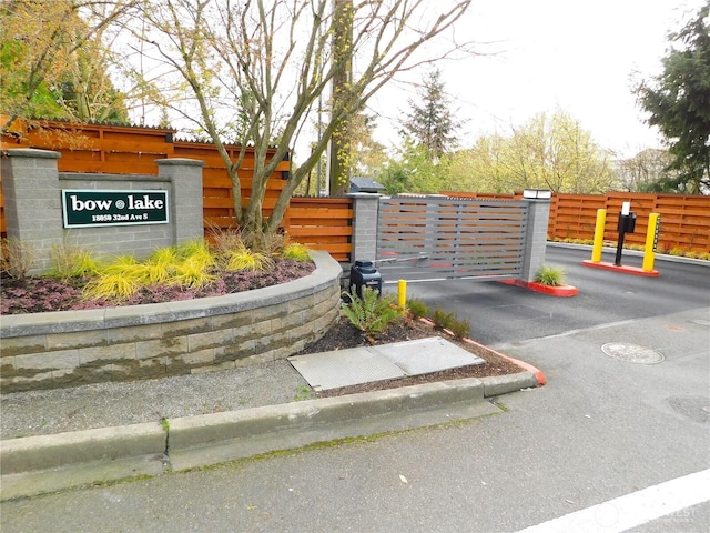 18329 32nd Ave S, Seatac, WA 98188 - exterior space featuring uncovered parking, a gate, and fence