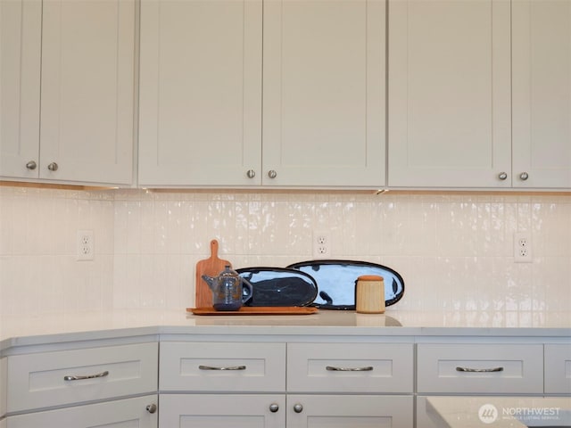303 Kakela Rd, Winlock, WA 98596 - kitchen with light countertops, tasteful backsplash, and white cabinetry