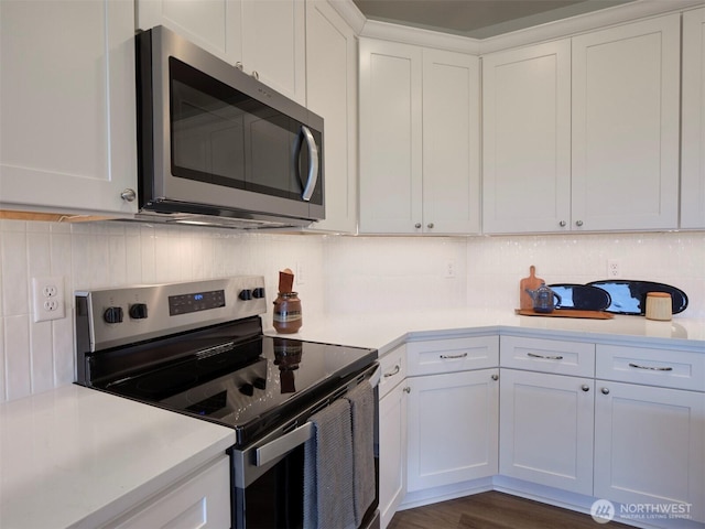 303 Kakela Rd, Winlock, WA 98596 - kitchen featuring appliances with stainless steel finishes, light countertops, and white cabinets