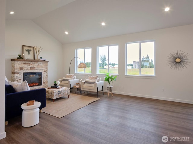 303 Kakela Rd, Winlock, WA 98596 - living room featuring wood finished floors, a fireplace, recessed lighting, baseboards, and lofted ceiling