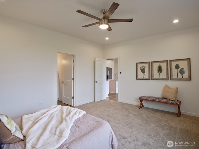 303 Kakela Rd, Winlock, WA 98596 - bedroom with carpet, stainless steel fridge, baseboards, recessed lighting, and a ceiling fan