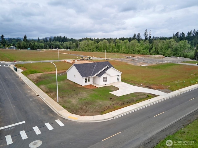 303 Kakela Rd, Winlock, WA 98596 - view from above of property with a heavily wooded area