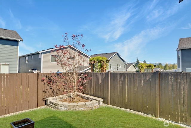 view of yard featuring a fenced backyard