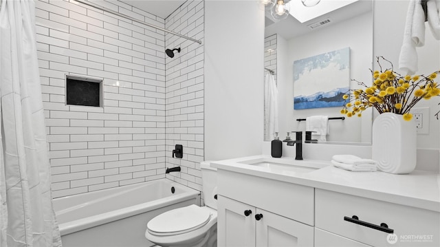 bathroom featuring visible vents, toilet, shower / bathtub combination with curtain, and vanity