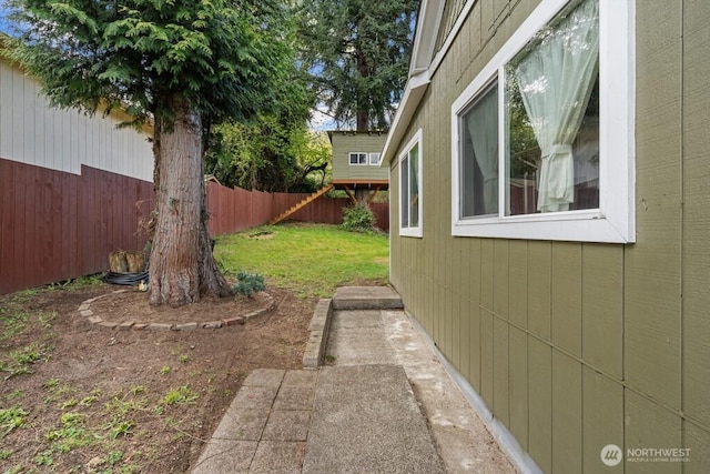 view of yard with a fenced backyard