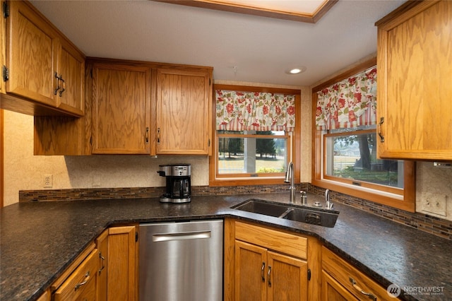 7095 N Wilde Rd, Concrete, WA 98237 - kitchen with dishwasher, a sink, decorative backsplash, and brown cabinets