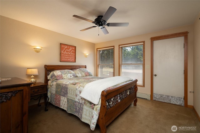7095 N Wilde Rd, Concrete, WA 98237 - carpeted bedroom featuring a baseboard radiator and a ceiling fan
