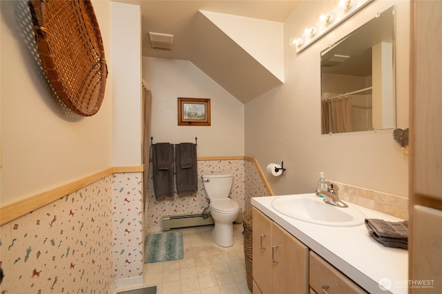 7095 N Wilde Rd, Concrete, WA 98237 - full bath with a baseboard radiator, toilet, vanity, vaulted ceiling, and a shower with curtain