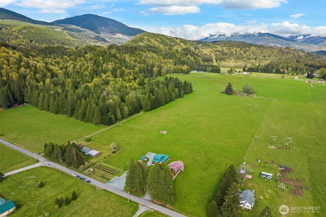 7095 N Wilde Rd, Concrete, WA 98237 - overview of rural landscape featuring a mountain backdrop and a heavily wooded area