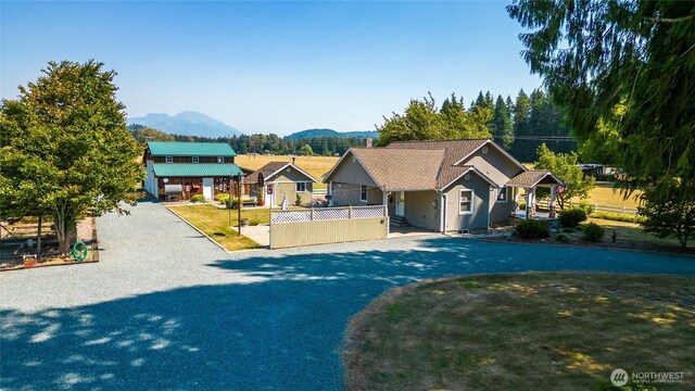 7095 N Wilde Rd, Concrete, WA 98237 - view of front facade featuring a mountain view and fence