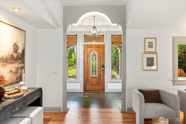 21908 36th Ave W, Brier, WA 98036 - entryway with decorative columns, wood finished floors, and arched walkways