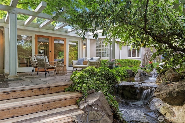 21908 36th Ave W, Brier, WA 98036 - rear view of property with a pergola, outdoor lounge area, a wooden deck, french doors, and a small pond