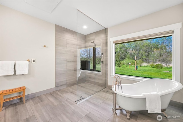 1699 Skagit St, Bellingham, WA 98226 - full bath with a freestanding bath, baseboards, and a walk in shower