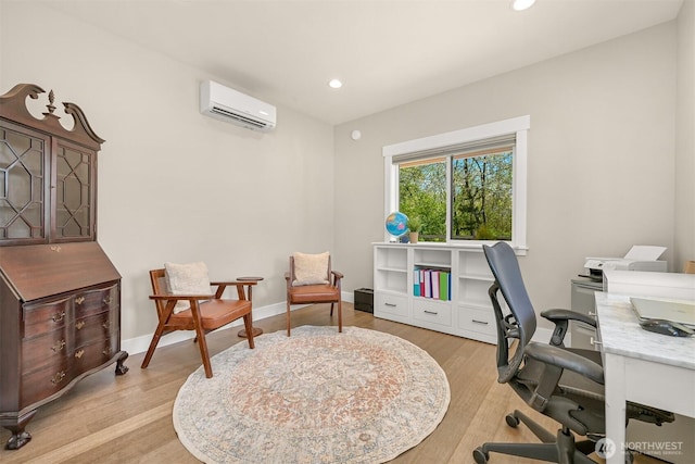 1699 Skagit St, Bellingham, WA 98226 - home office featuring recessed lighting, a wall mounted AC, light wood-style flooring, and baseboards
