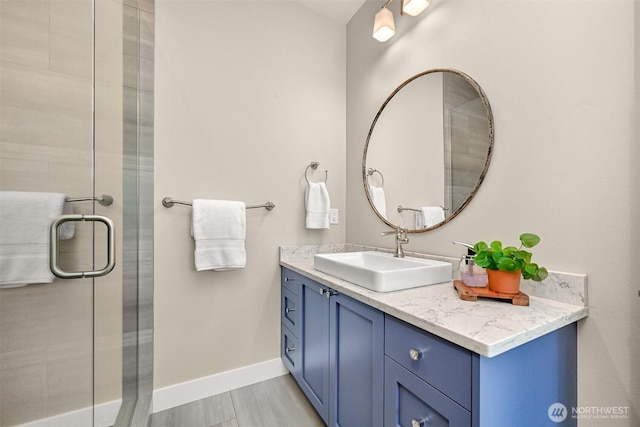 1699 Skagit St, Bellingham, WA 98226 - full bathroom featuring vanity, baseboards, and a stall shower