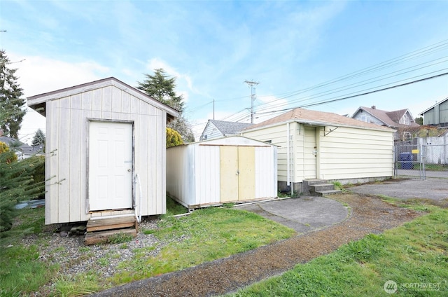1257 S Ridgewood Ave, Tacoma, WA 98405 - view of shed with entry steps and fence