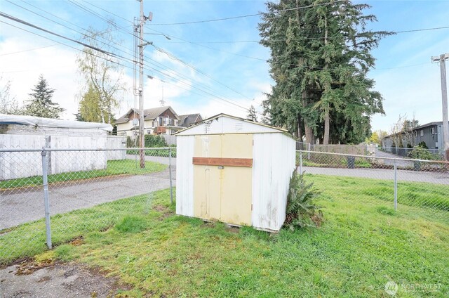 1257 S Ridgewood Ave, Tacoma, WA 98405 - view of shed featuring a fenced backyard