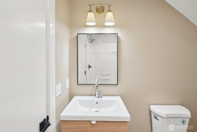 bathroom featuring toilet and a sink