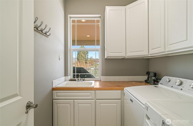 107 Springhill Dr, East Wenatchee, WA 98802 - washroom with a sink, washing machine and clothes dryer, and cabinet space