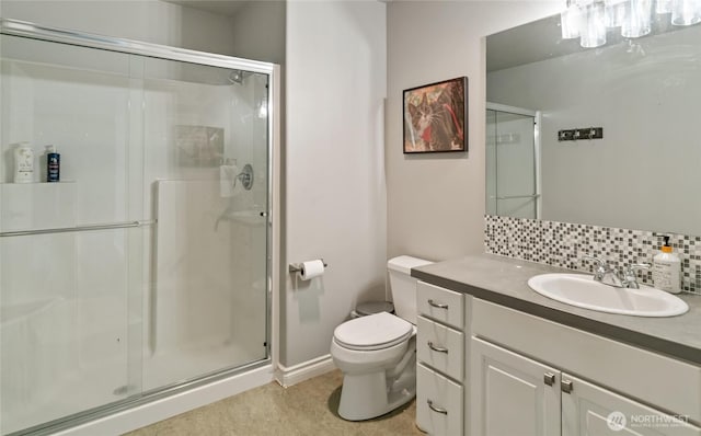 107 Springhill Dr, East Wenatchee, WA 98802 - full bathroom with toilet, vanity, backsplash, and a stall shower
