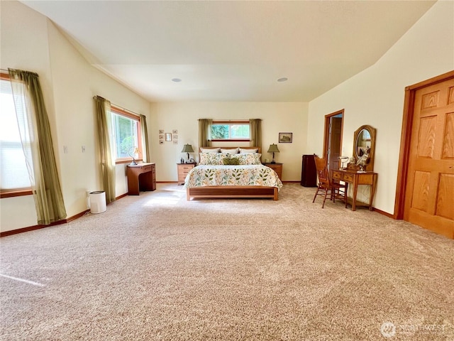 carpeted bedroom with baseboards