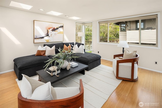 510 Lakeside Ave S Unit 10, Seattle, WA 98144 - living room with baseboards, wood finished floors, and a skylight