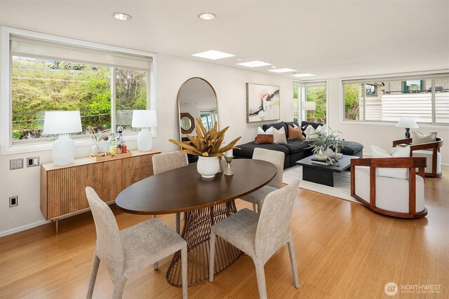 510 Lakeside Ave S Unit 10, Seattle, WA 98144 - dining room featuring recessed lighting, light wood-style floors, baseboards, and a healthy amount of sunlight