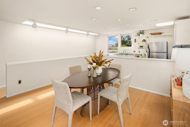 510 Lakeside Ave S Unit 10, Seattle, WA 98144 - dining space featuring baseboards, light wood finished floors, and recessed lighting