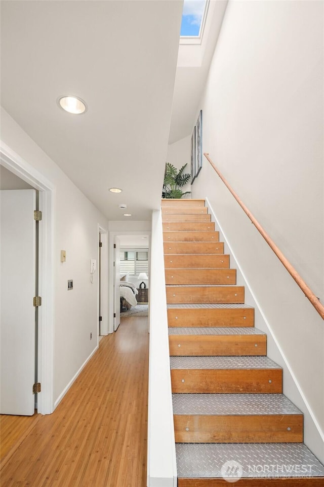 510 Lakeside Ave S Unit 10, Seattle, WA 98144 - staircase with a skylight, recessed lighting, wood finished floors, and baseboards
