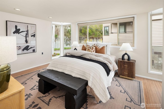 510 Lakeside Ave S Unit 10, Seattle, WA 98144 - bedroom with recessed lighting, baseboards, and wood finished floors