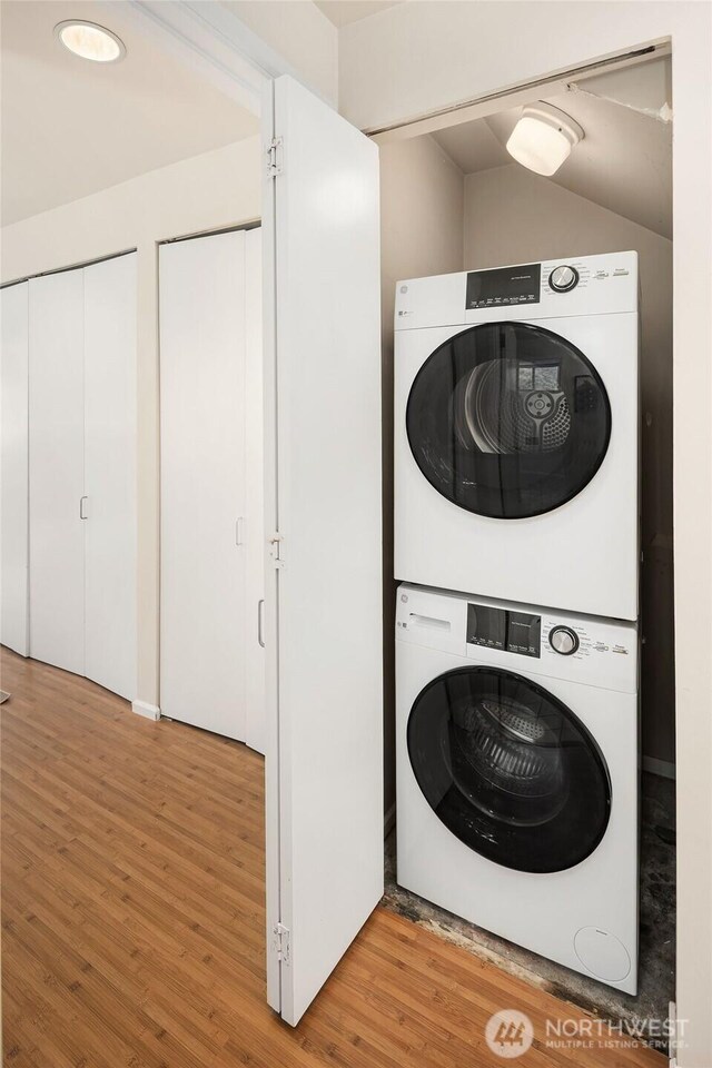 510 Lakeside Ave S Unit 10, Seattle, WA 98144 - laundry room featuring stacked washing maching and dryer, light wood finished floors, and laundry area