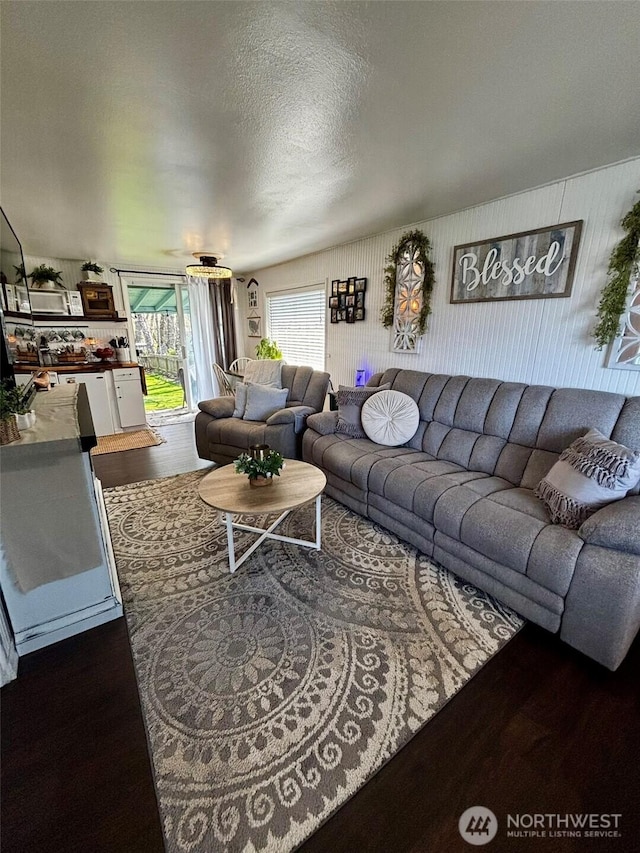 4216 N Pl, Seaview, WA 98644 - living area with a textured ceiling and dark wood-style floors