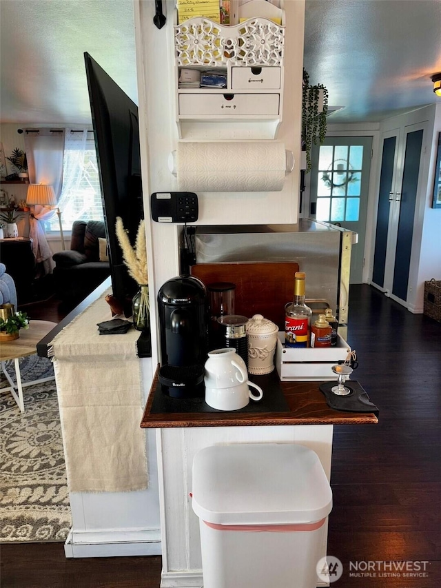 4216 N Pl, Seaview, WA 98644 - kitchen featuring wood finished floors and a healthy amount of sunlight