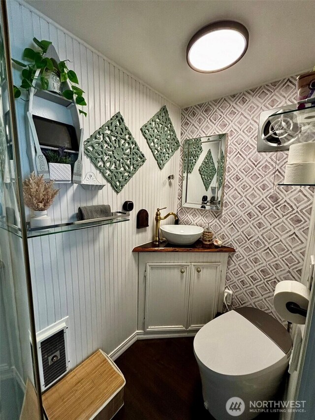 4216 N Pl, Seaview, WA 98644 - bathroom with wood finished floors, vanity, and toilet