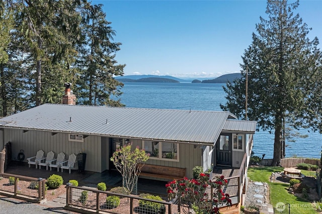 162 Sea Ranch Rd, Lopez Island, WA 98261 - exterior space featuring metal roof and a water and mountain view