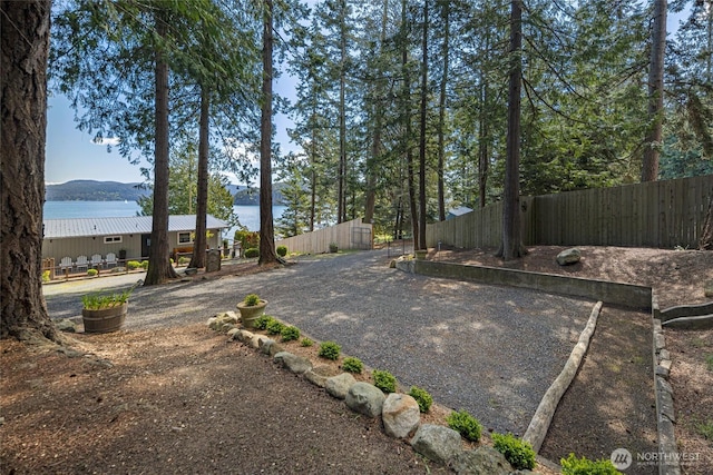 162 Sea Ranch Rd, Lopez Island, WA 98261 - view of yard featuring a water view and fence