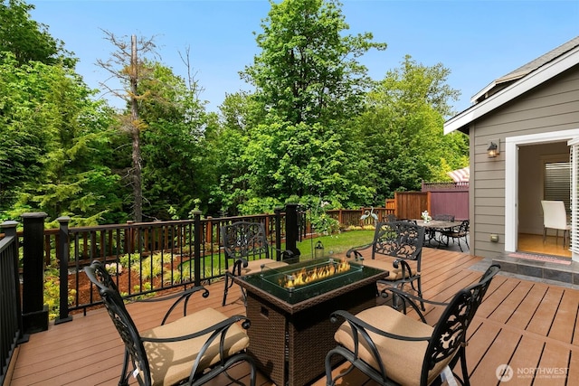 3262 NE Marquette Way, Issaquah, WA 98029 - wooden terrace with a fire pit and outdoor dining space