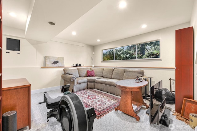 carpeted living room featuring recessed lighting and baseboards