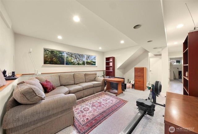 carpeted living area featuring recessed lighting