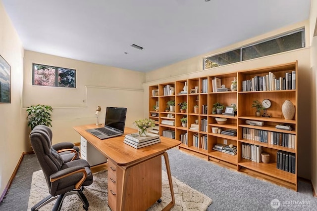 office area with baseboards and visible vents
