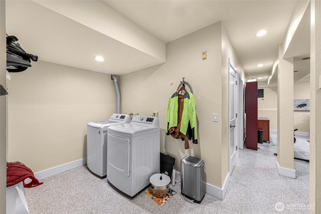 washroom with separate washer and dryer, baseboards, recessed lighting, and laundry area