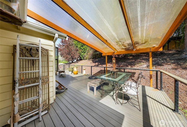 wooden deck with outdoor dining area