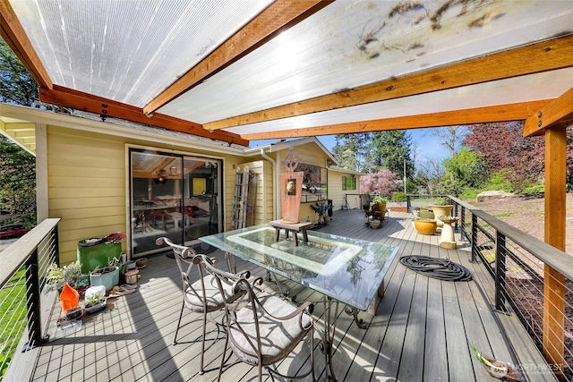 wooden deck with outdoor dry bar